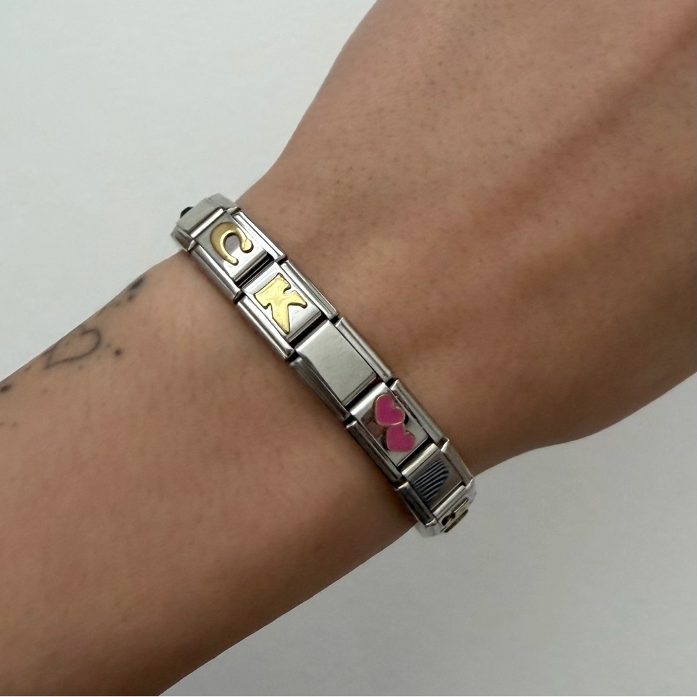 vintage 2000s ck 50 silver and gold italian charm bracelet